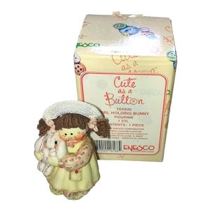 Vintage Cute As A Button Girl Holding Bunny Figurine